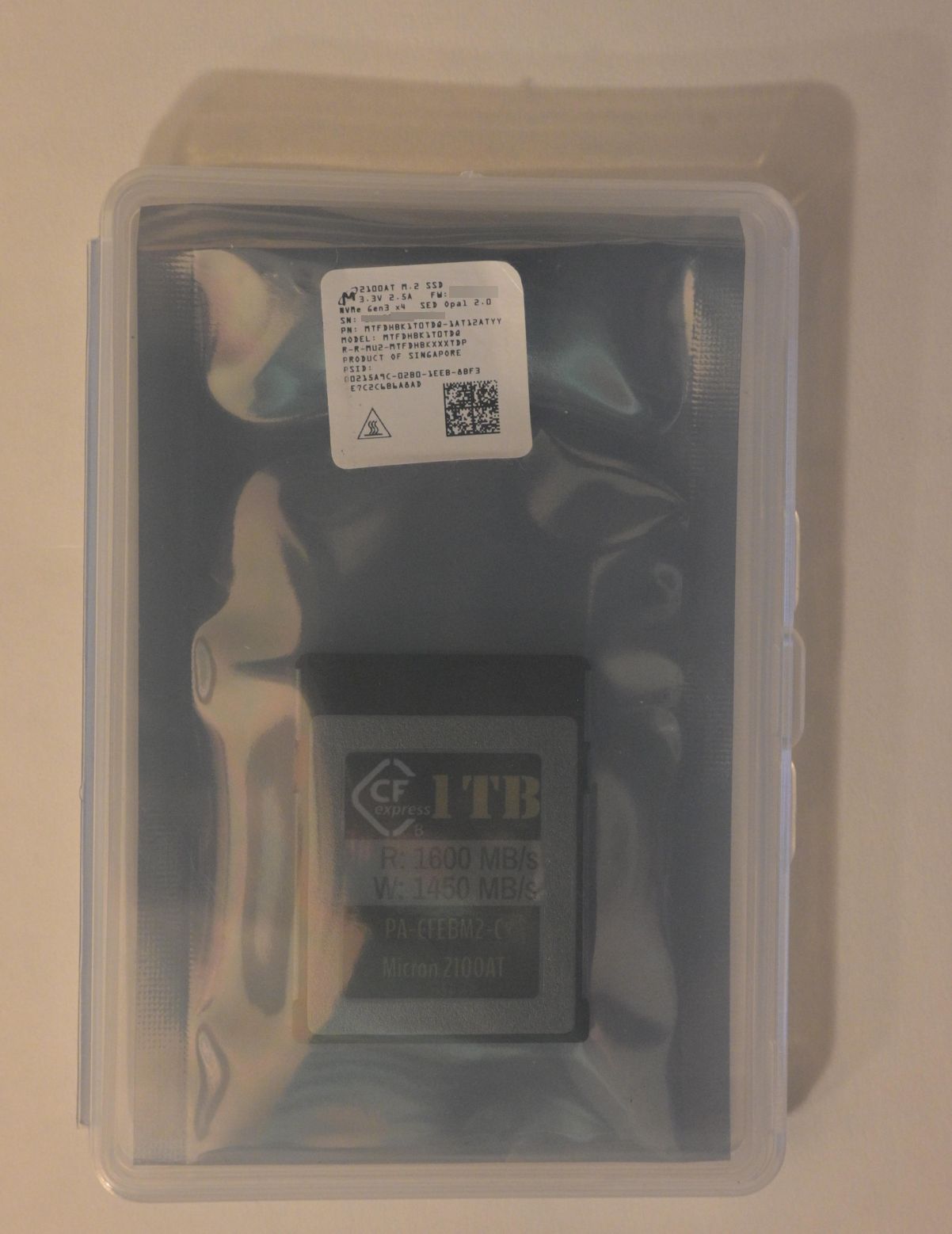 1TB card in case SN and Firmware blurred.jpg