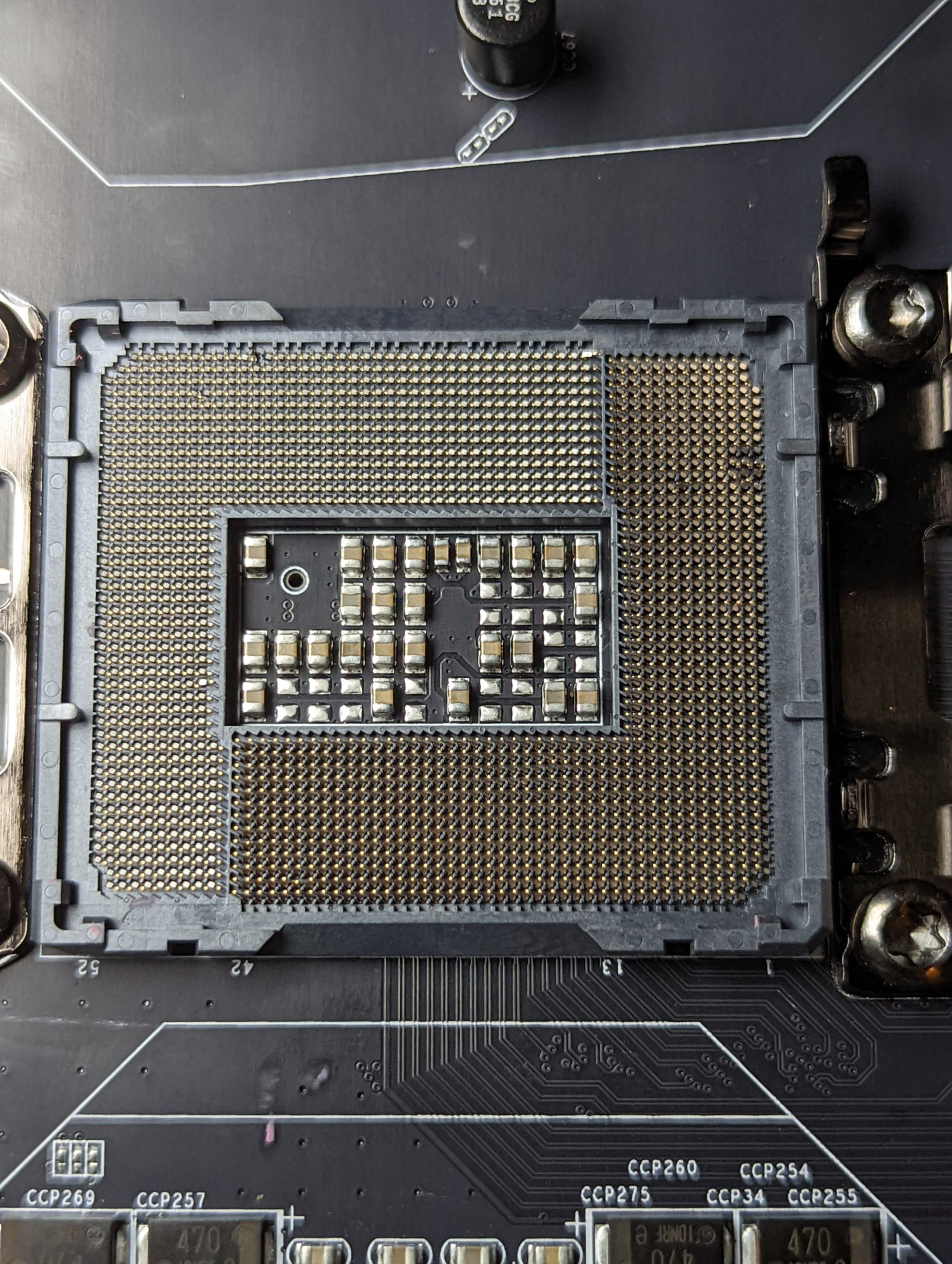 lga 1700 socket has thermal paste and possibly bent pins. is it